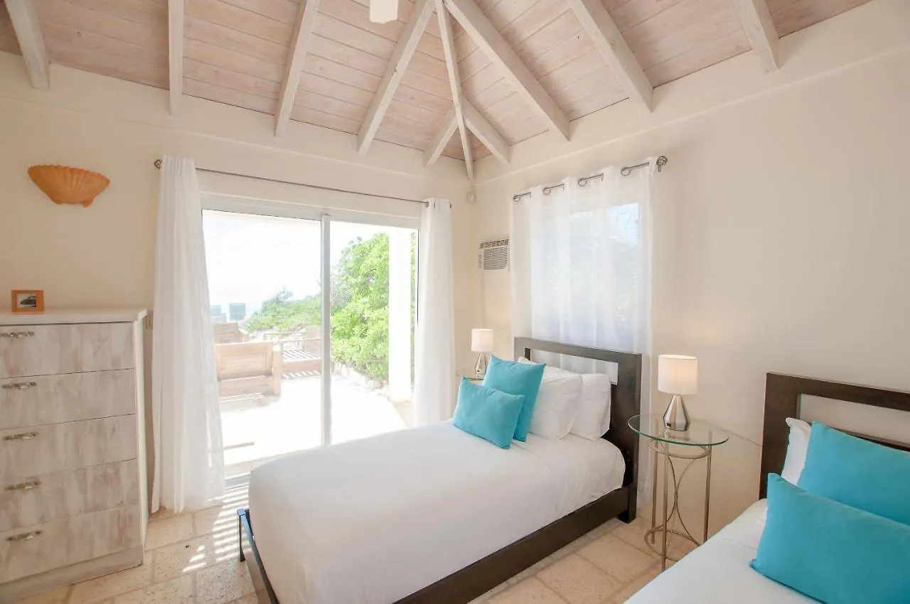 Vakantiehuis Aqua Del Rose 2 Bedroom Beachfront Cottage Long Bay